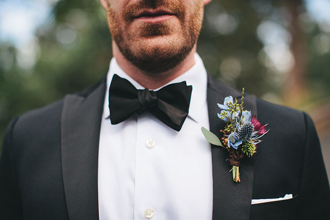 Alpine Thistle and Blue Delphinium Boutonniere